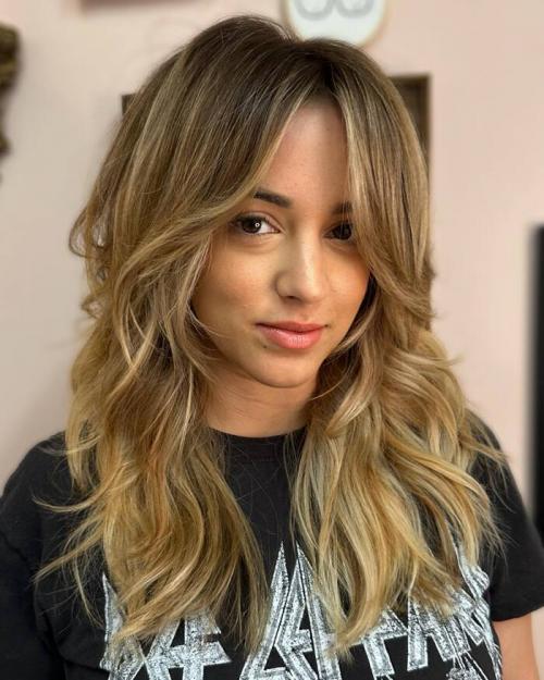 Модные стрижки на средние волнистые волосы с челкой: тренды 2019 года 32 Модные стрижки на средние волнистые волосы с челкой: тренды 2019 года 32