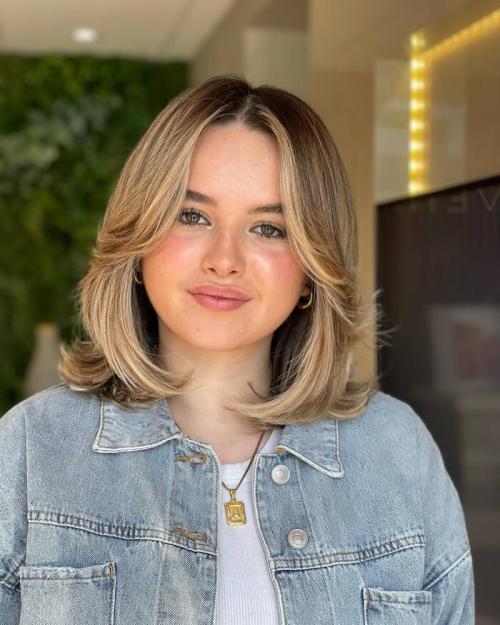 Модные стрижки на средние волнистые волосы с челкой: тренды 2019 года 19 Модные стрижки на средние волнистые волосы с челкой: тренды 2019 года 19