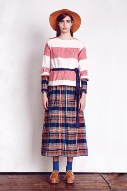 Розовая юбка в клетку. Модные фасоны юбок в клетку