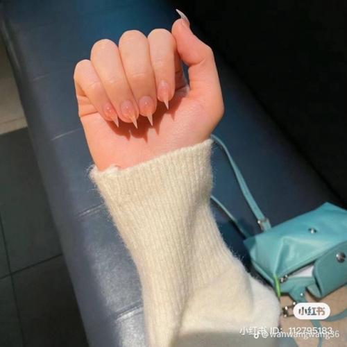 В Китае вирусится маникюр в виде острых кошачьих коготков. 03