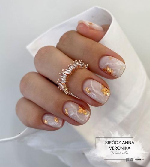 Нюдовый маникюр выполняют в максимально естественных, нейтральный цветах. 02 Нюдовый маникюр выполняют в максимально естественных, нейтральный цветах. 02