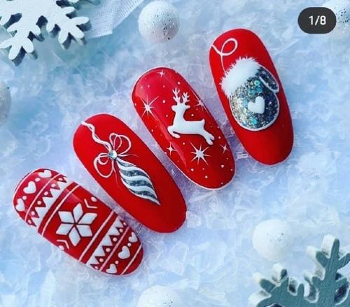 Трендовый новогодний маникюр немыслим без блесток и разного рода сверкающего декора, что делает новогодние ноготки невероятно сияющими и нарядными. 03