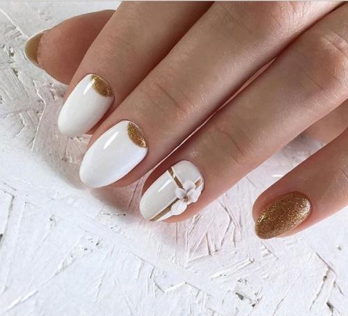 Какая из идей белого маникюра понравилась вам больше всего? 09