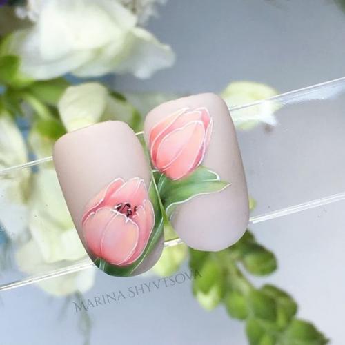 Романтичность и нежность каждому дизайну ногтей смогут придать цветочные мотивы, что порой просты, незатейливы, а иногда весьма потрясающие. 04