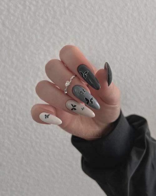 В случае если хочется чего-то милого, наивного и воздушного - выбирайте маникюр с бабочками. 02