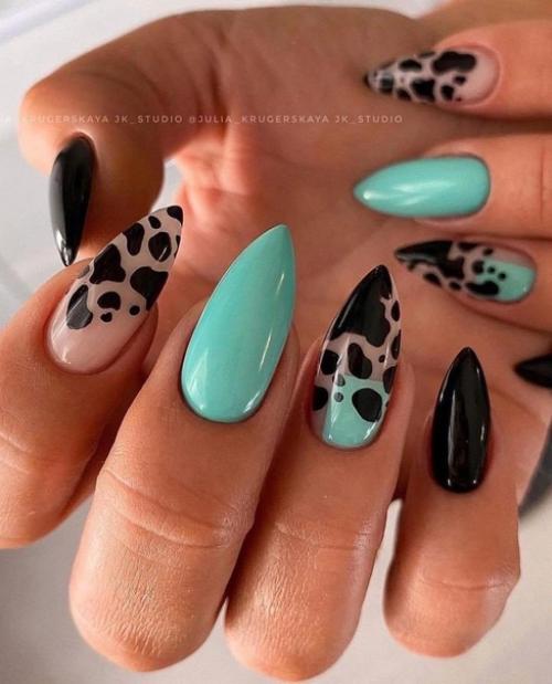 Маникюр с леопардовым окрасом - это стильный и смелый дизайн, который привлекает внимание и придает ногтям уникальный вид. 01